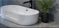 White ceramic sink on a bathroom vanity